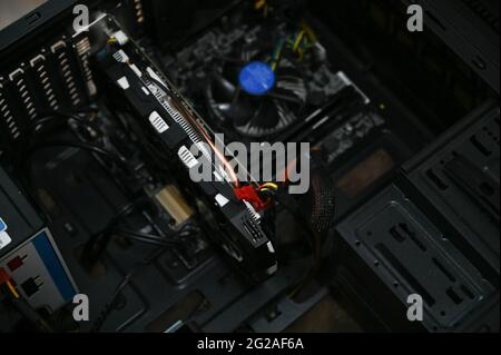 A black computer case with a new video card installed Stock Photo