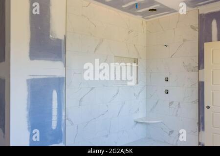 Designer renovation construction bathroom with master bathroom patching drywall Stock Photo