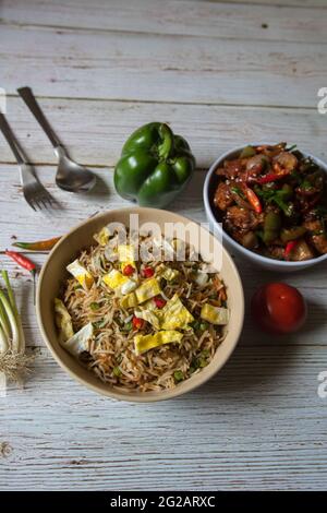 Popular lunch food ingredient fried rice on a plate. Top view. Stock Photo
