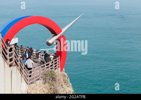 Busan, South Korea - March 18, 2018: Tourists are at a seaside viewpoint terrace of Taejongdae park Stock Photo