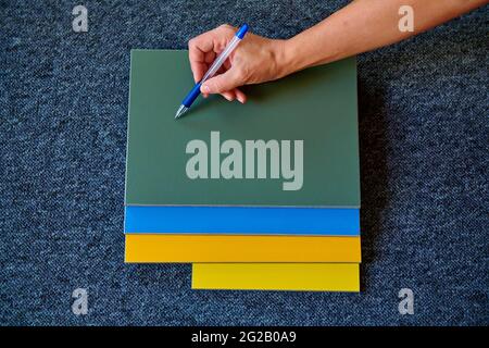 colored tiles for interior decoration in blue and yellow colors Stock Photo