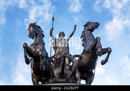 Bronze Boudica staue against summer sky in London, UK. This statue was commissioned in the 19th Century by Queen Victoria, and represents Boudica, or Stock Photo