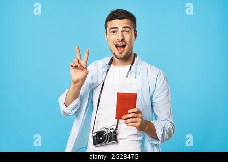 male photographer with travel passport Professional tourism Stock Photo