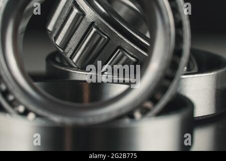 Two new car bearings on a black background macro photo Stock Photo