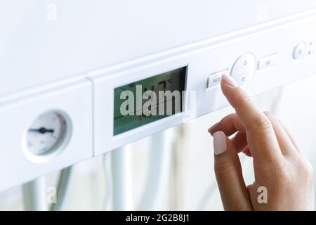 The choice of the eco mode of operation of the heating gas boiler Stock Photo