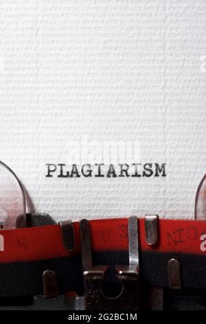 The word plagiarism written with a typewriter. Stock Photo
