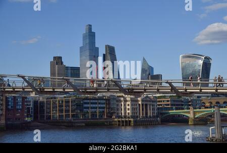 City of London skyline and Millennium Bridge on a clear, warm day. London, United Kingdom 9th June 2021. Stock Photo