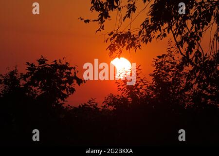 Annular Solar Eclipse, June 10, 2021. Partial eclipse of sun viewed from Whitelaw, WI near Manitowoc and Two Rivers at 5:20AM. Stock Photo