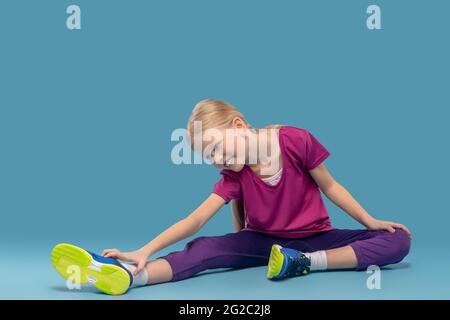 Child Sitting W Posture On The Floor Stock Photo - Alamy