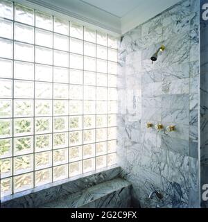 Glass tiled window by shower Stock Photo
