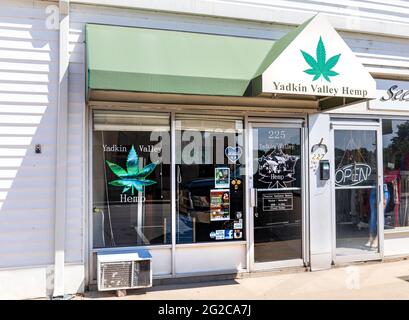 ELKIN, NC, USA-5 JUNE 2021:  The Yadkin Valley Hemp store, on main street.  Horizontal image. Stock Photo