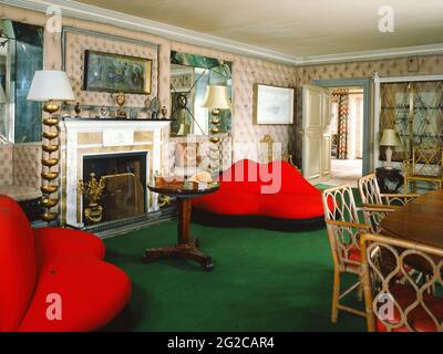 Retro lip shaped sofas in living room Stock Photo