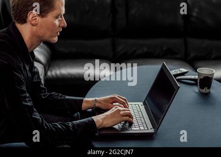 Man using laptop Stock Photo