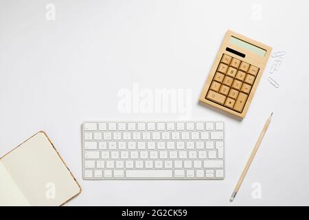 Various items on white desk Stock Photo