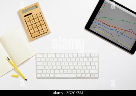 Various items on white desk Stock Photo