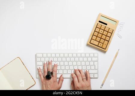 Various items on white desk Stock Photo
