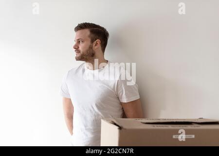 Mid adult man looking away Stock Photo