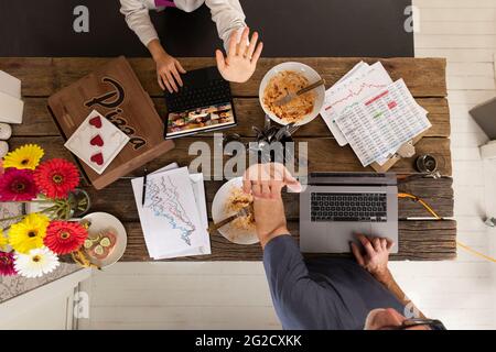 High angle view of people working at home Stock Photo