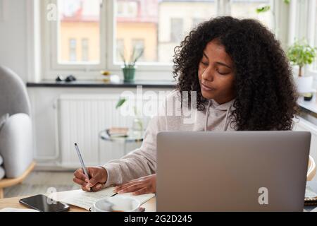 Woman working in office Stock Photo