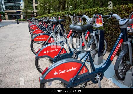 Santander Bikes parked at Canary Wharf Stock Photo