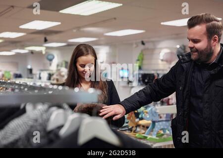 Young couple in clothes shop Stock Photo