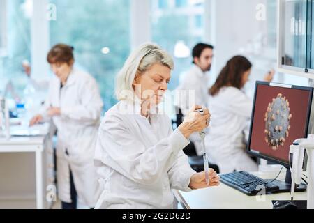 Woman working in laboratory Stock Photo