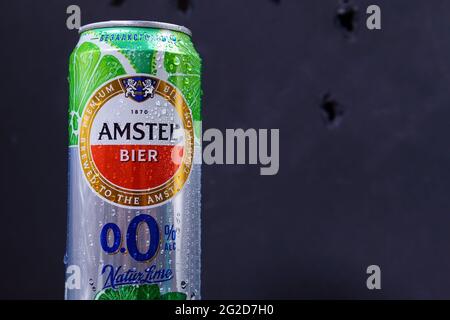 Tyumen, Russia-May 25, 2021: Amstel beer can non-alcoholic with lime and mint. Dark background Stock Photo