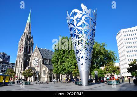 Christchurch, New Zealand - NOV 26, 2010: Chalice sculpture by Neil Dawson and Christchurch Anglican cathedral in in Cathedral Square Stock Photo