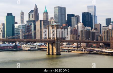 Eastern pylon of Brooklyn Bridge before Lower Manhattan, New York City Stock Photo