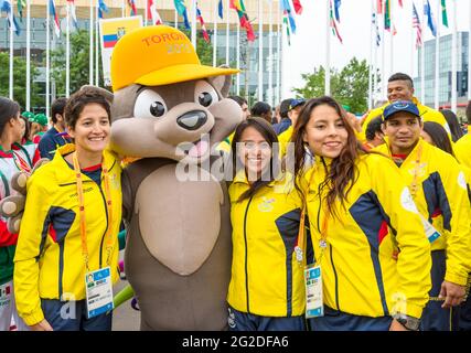 Athletes from Ecuador posing for photograph with the mascot Pachi the Porcupine at the 2015 Pan Am Games, Toronto. Pan-Am Games were a major internati Stock Photo