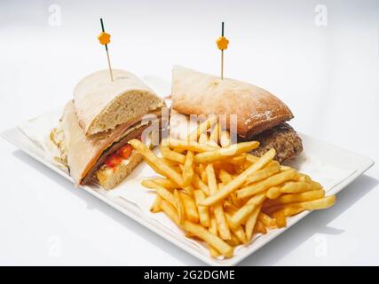 Beef sirloin sandwich with ham and cheese Stock Photo