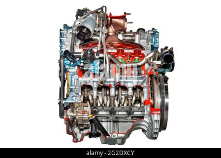 Internal combustion engine of a modern car on a stand with a cut of the piston group. Isolated on white background. Automotive motor. Auto parts. Stock Photo