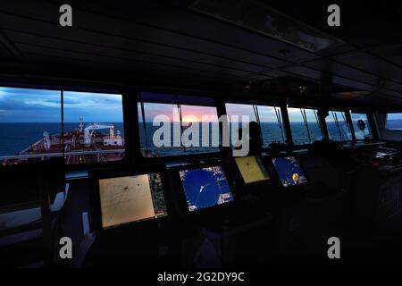 electronic navigation equipment, sailing in calm weather, cloudy dayr, view from the bridge Stock Photo