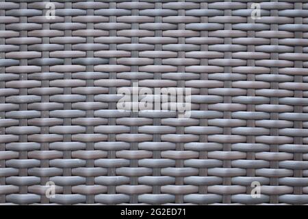 Dark brown woven rattan taxture background Stock Photo