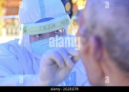 Guangzhou, China. 10th June, 2021. The new round of COVID-19 nucleic acid testing starts in Guangzhou, Guangdong, China on 10th June, 2021.(Photo by TPG/cnsphotos) Credit: TopPhoto/Alamy Live News Stock Photo