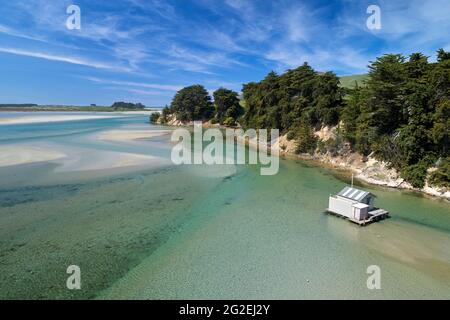 Boatshed, Hoopers Inlet, Otago Peninsula, Dunedin, South Island, New Zealand - drone aerial Stock Photo