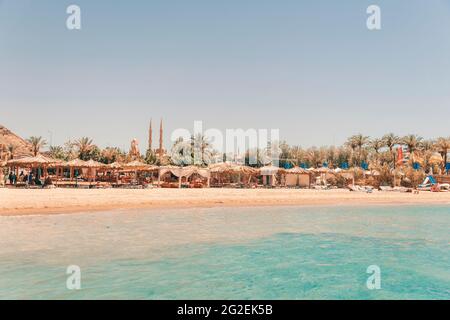 Panorama of a view of beaches and the old city from height. Al Mustafa Mosque in the Old Town of Sharm El Sheikh Stock Photo