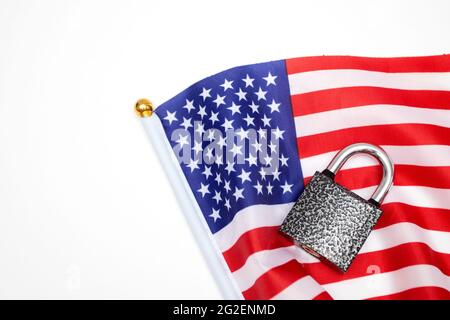 Padlock and US flag. The political concept of closed borders. USA locked Stock Photo