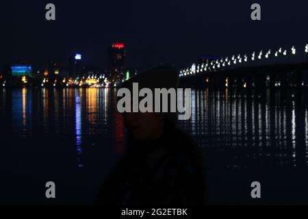 night city as it is beautiful lights on the background of the river Stock Photo