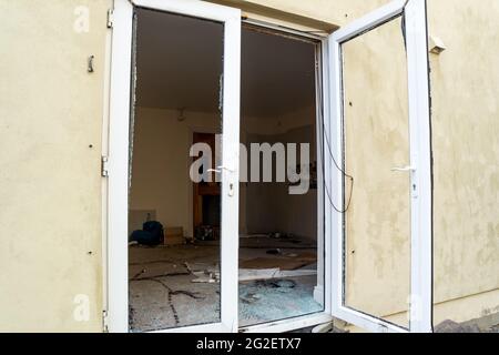 Broken glass after break in at glas door Stock Photo
