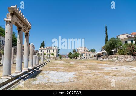 View of the Roman Agora, ancient square in Athens, Greece, Europe. Panorama of old Greek ruins at Plaka district in Athens city center. Stock Photo