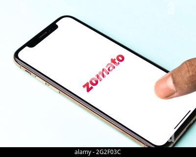 Assam, india - June 7, 2021 : Zomato logo on phone screen stock image. Stock Photo