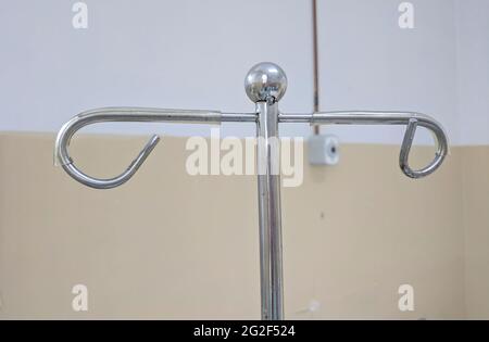 Saline Solution Bottle Hanging on a Metal Pole in a Romanian Hospital. 23 April 2019, Bucharest, Colentina Hospital Stock Photo