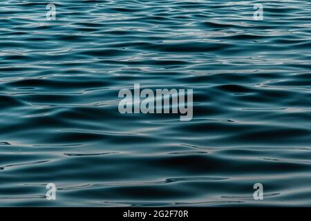 defocused blue water surface background Stock Photo