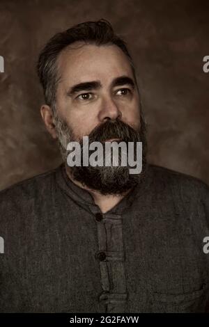 vintage portrait of adult man with beard Stock Photo