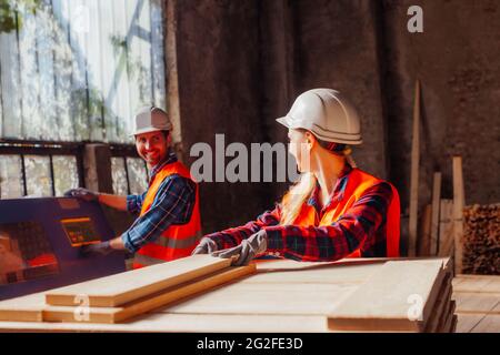 Workers on the wood factory manufacture production line Stock Photo
