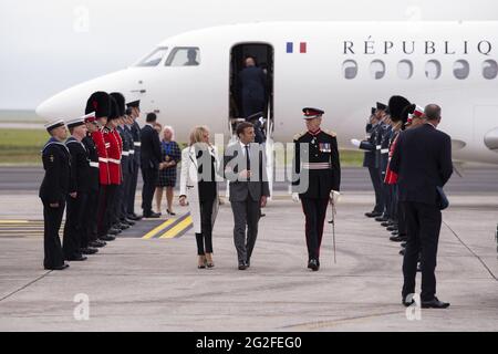 Newquay, UK. 11th June, 2021. President of France Emmanuel Macron and his wife Brigitte Macron arrive at Cornwall Airport Newquay on June 11, 2021, ahead of the G7 summit in Cornwall. Photo by Doug Peters/G7 Cornwall 2021/UPI Credit: UPI/Alamy Live News