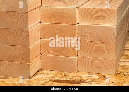 Closeup of construction lumber boards. Building materials price increase, home construction and remodeling cost concept. Stock Photo