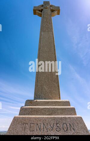 Tennyson Monument - a simple but imposing granite Celtic cross on Tennyson Down high above the south coast of the Isle of Wight UK Stock Photo