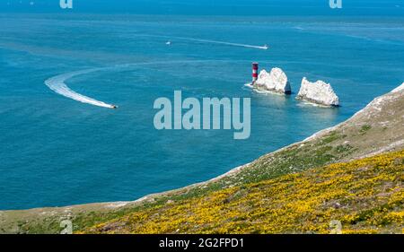 The Needles chalk stacks and Needles lighthouse guarding The Solent at the western point of the Isle of Wight UK Stock Photo